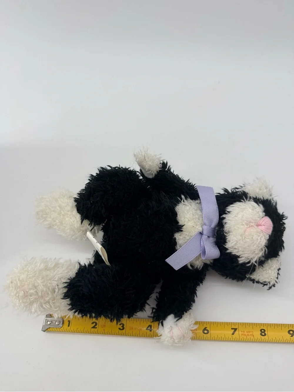 Plush Black & White Cat Toy with Lavender Bow - Soft Cuddly Pet Playmate